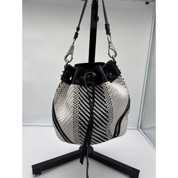 she + lo Make Your Mark Woven Leather Drawstring Bucket Bag BLACK WHITE - Picture 1 of 6
